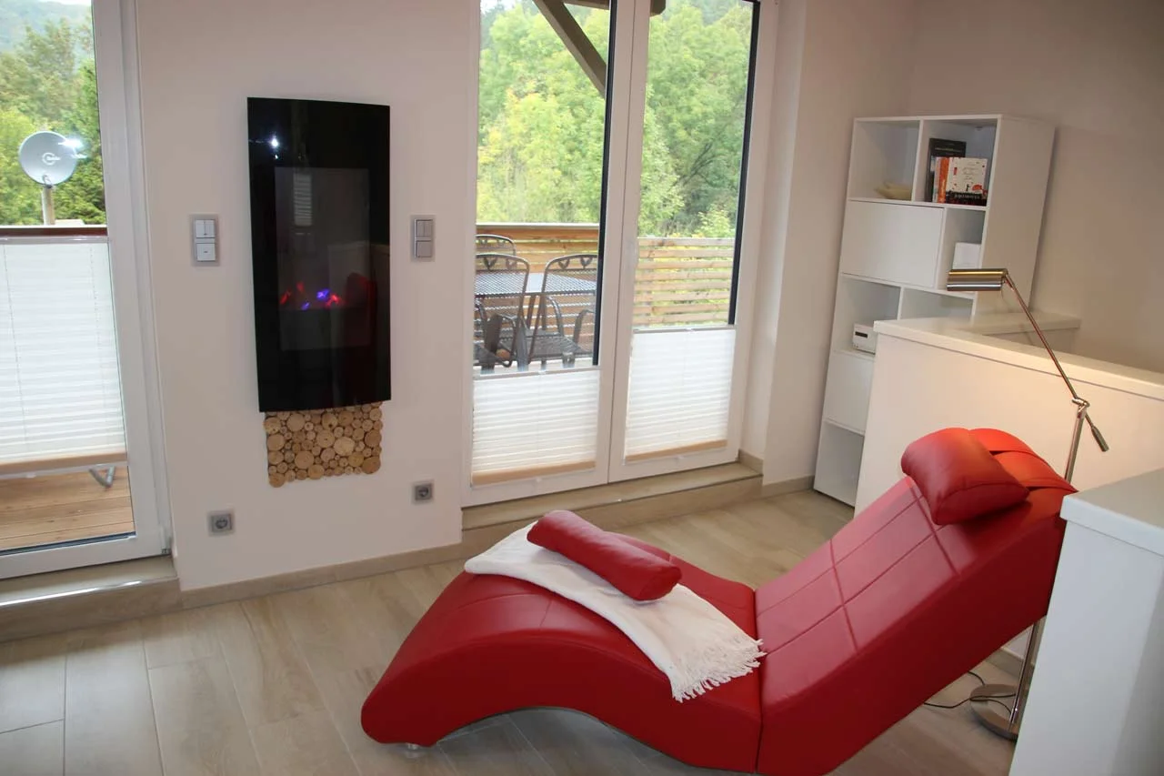 Wohnzimmer mit Kamin